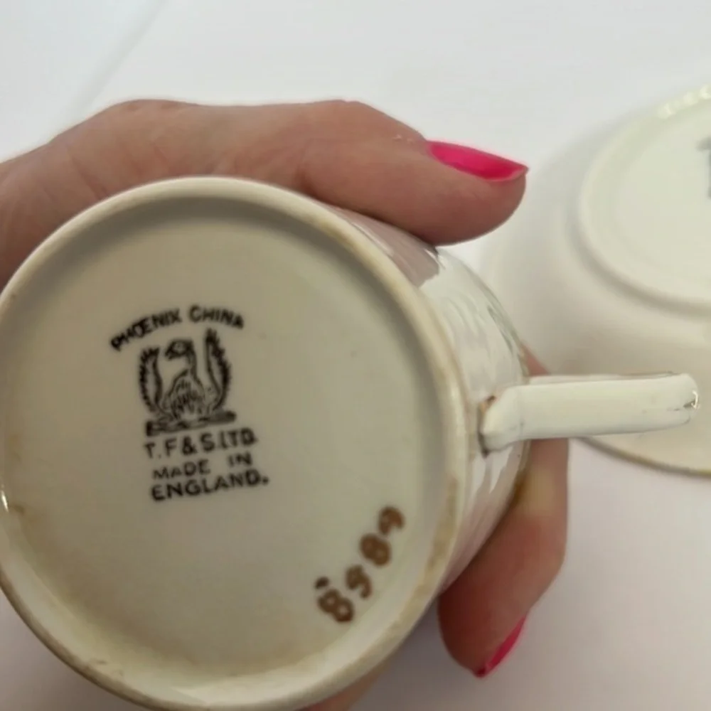 TF& S LTD, DEMITASSE CUP AND SAUCER